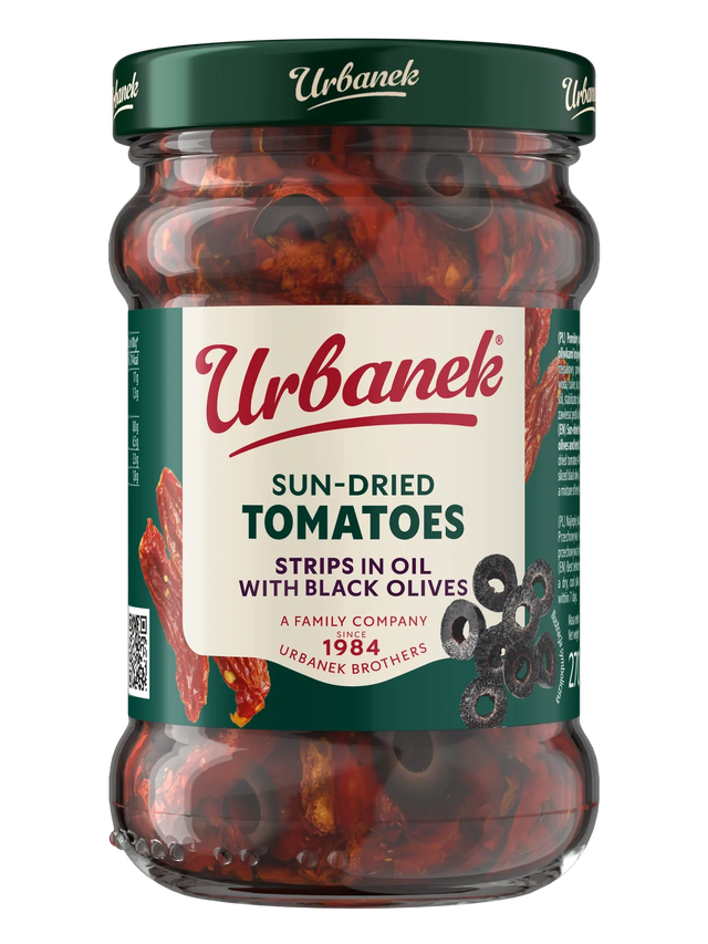 Sun-dried tomatoes strips in oil with olives