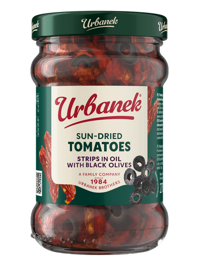 Sun-dried tomatoes strips in oil with olives