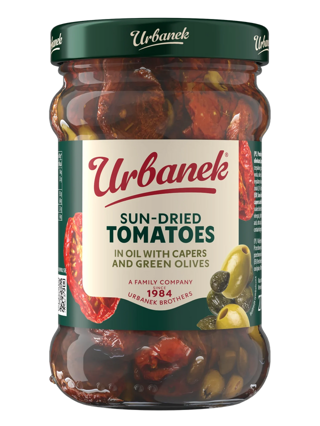 Sun-dried tomatoes halves in oil with capers and olives